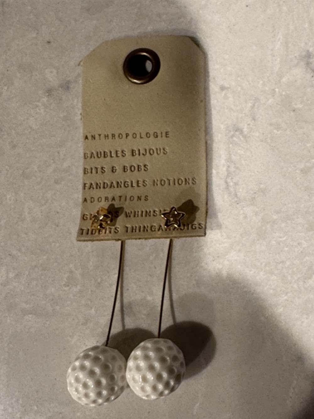Anthropologie White Golf Ball Icon Drop threader Earrings